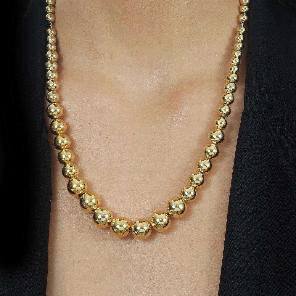 Colar dourado Sphères Croissantes Simplicité em detalhe