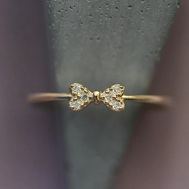 Anel Prata 925 Laço Micro Zircônia Banhado Ouro – Nœud Brillant Simplicité