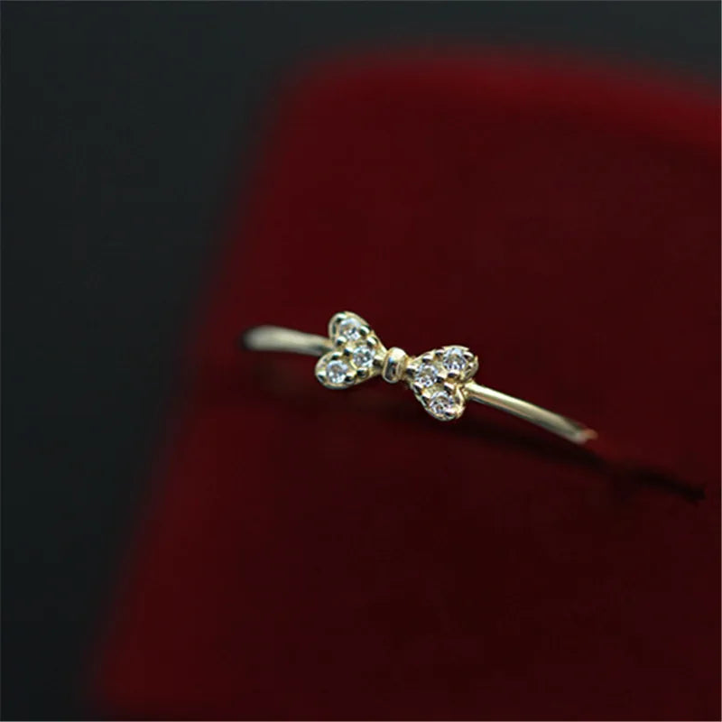 Anel Prata 925 Laço Micro Zircônia Banhado Ouro – Nœud Brillant Simplicité