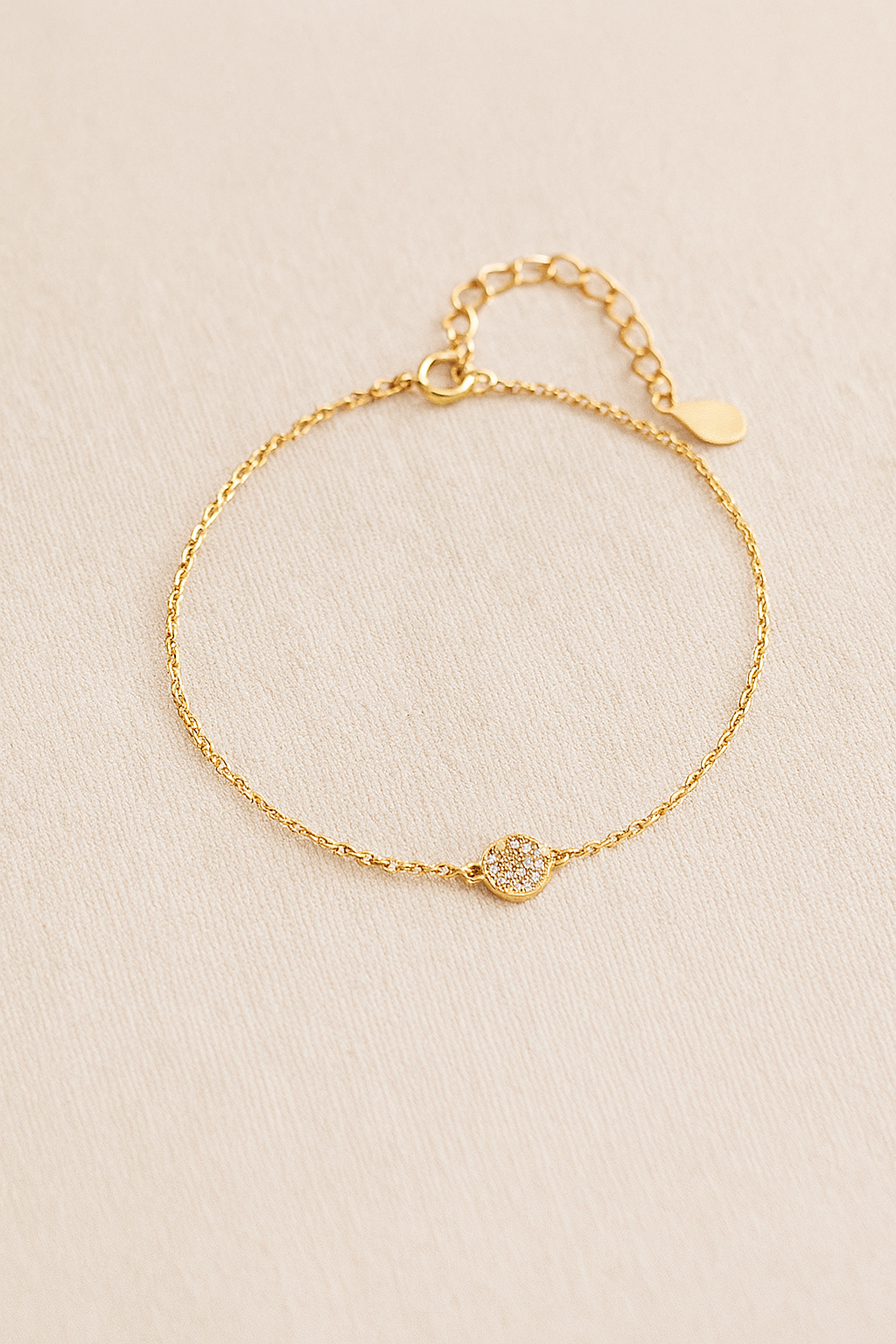 Pulseira dourada com olho grego de zircônia azul - Loja Simplicité