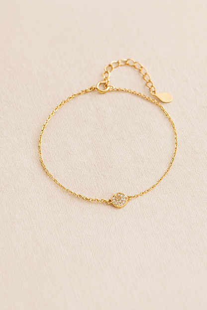 Pulseira dourada com olho grego de zircônia azul - Loja Simplicité