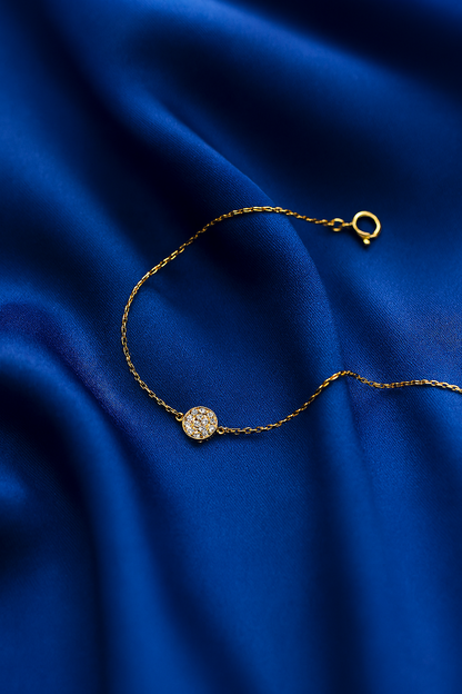 Pulseira dourada com olho grego de zircônia azul - Loja Simplicité