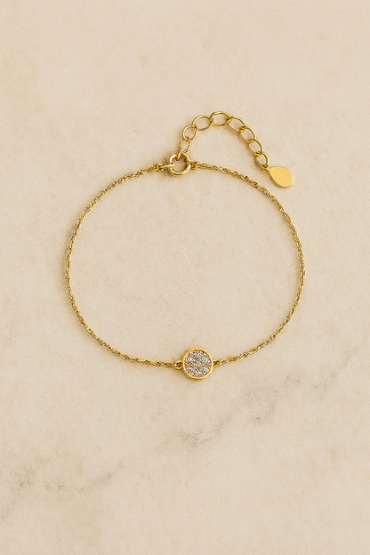 Pulseira dourada com olho grego de zircônia azul - Loja Simplicité