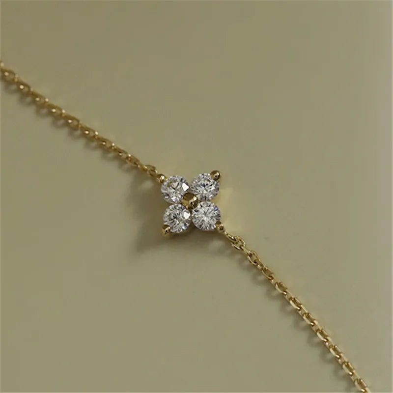 Pulseira dourada com pingente flor de zircônias, prata 925 banhada a ouro 14K, Loja Simplicité
