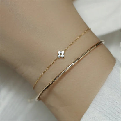 Pulseira dourada delicada com flor de zircônia, prata 925 banhada a ouro, Loja Simplicité