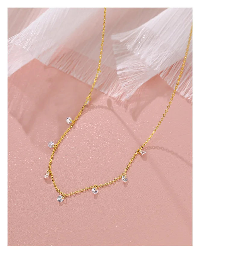 Colar dourado cascata de zircônias em prata 925 banhada a ouro 14K – Loja Simplicité
