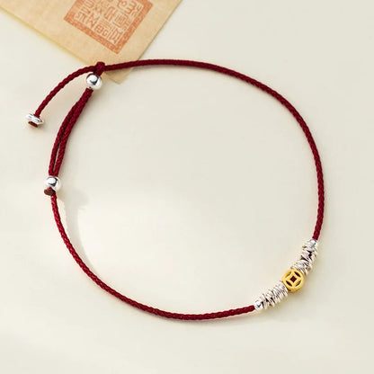 Pulseira da sorte dourada com cordão vermelho - Loja Simplicité