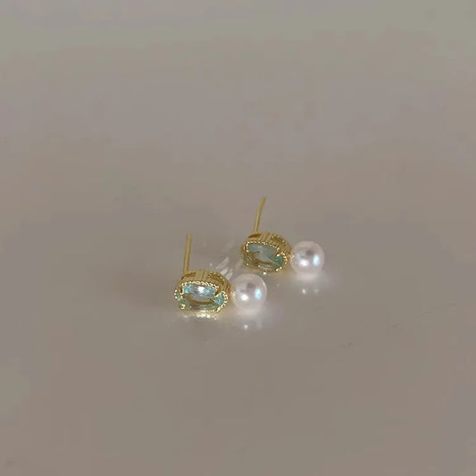 Brinco dourado de pérola com zircônia azul, prata 925 banhada a ouro - Loja Simplicité