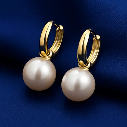 Joia feminina brinco pérola delicado sobre fundo veludo azul royal Simplicité