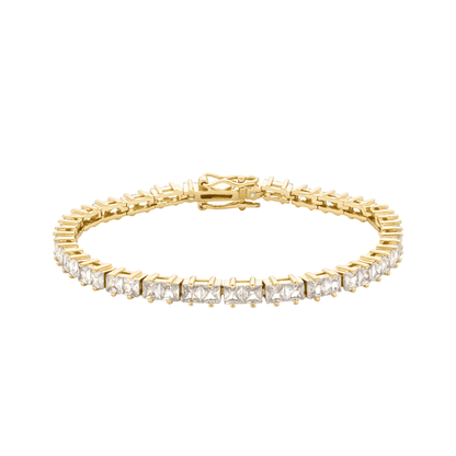 Pulseira riviera dourada com zircônias cravejadas Rivière Lumineuse Simplicité sobre fundo branco