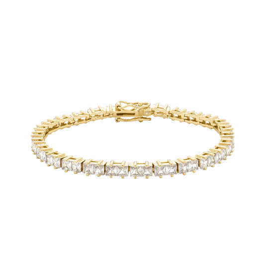 Pulseira riviera dourada com zircônias cravejadas Rivière Lumineuse Simplicité sobre fundo branco