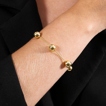 Pulseira dourada Grandes Sphères Simplicité em detalhe