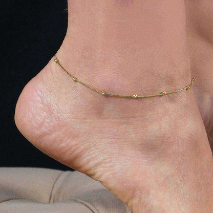 Tornozeleira dourada Cheville à Billes Simplicité em detalhe