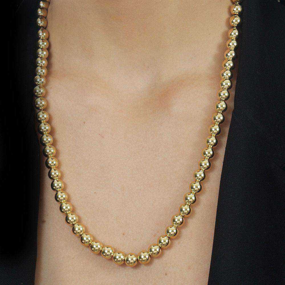 Colar dourado Sphères Dorées Simplicité em detalhe