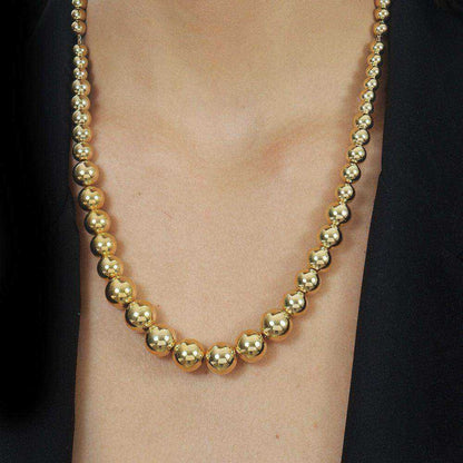 Colar dourado Sphères Croissantes Simplicité em detalhe