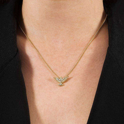 Colar dourado Esprit Saint Simplicité em detalhe