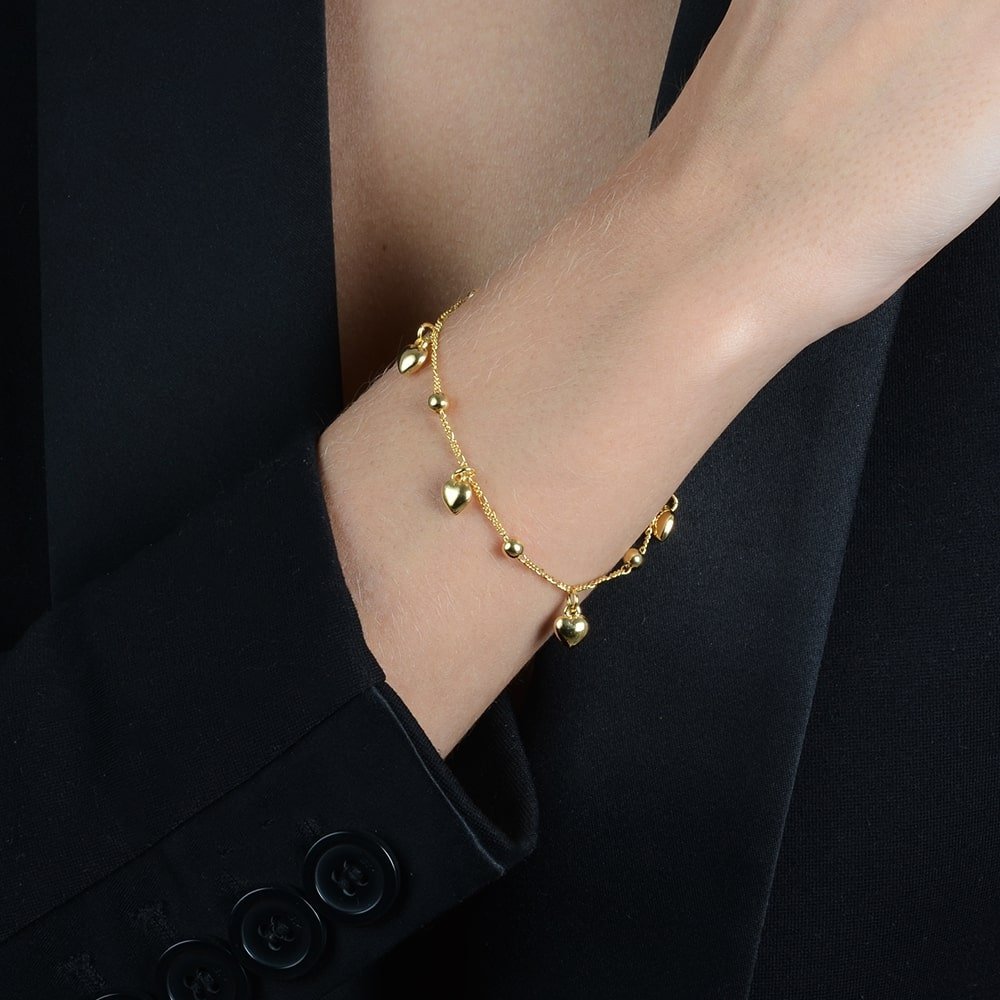 Pulseira dourada Cœurs Dorés Simplicité em detalhe