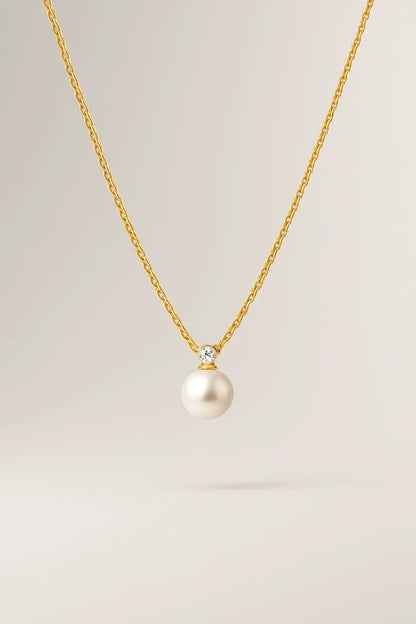 Colar pérola de luz dourado vista frontal design clássico elegante