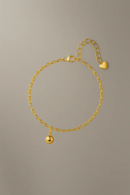 Pulseira de esferas dourada vista frontal design geométrico minimalista