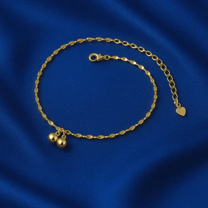 Joia feminina tornozeleira charmosa delicada sobre fundo veludo azul royal Simplicité